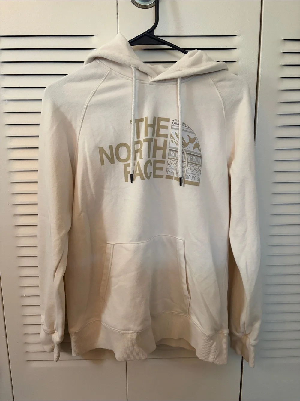 The North Face Men's Cream Pullover Hoodie with Tan Logo